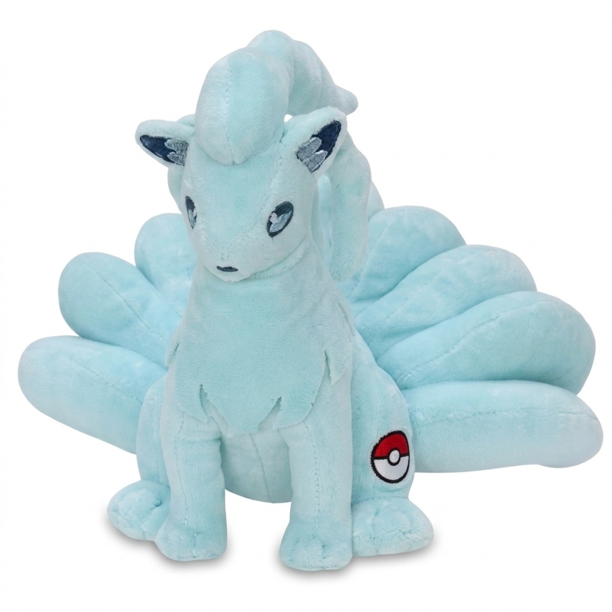 Ninetales z Alola Pluszak z odznaką potwierdzającą autentyczność produktu.