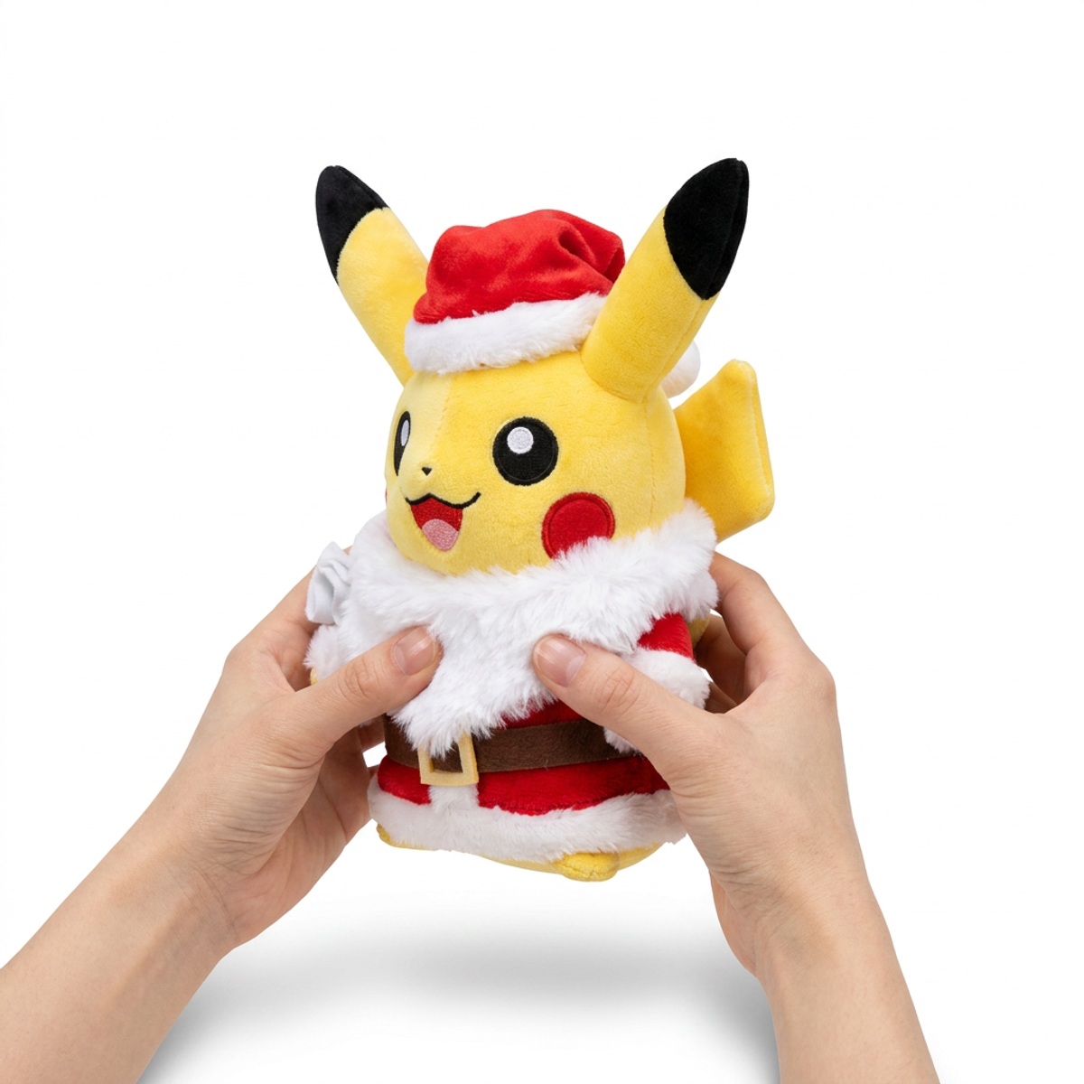 Świąteczny Pikachu Pluszak trzymany w rękach