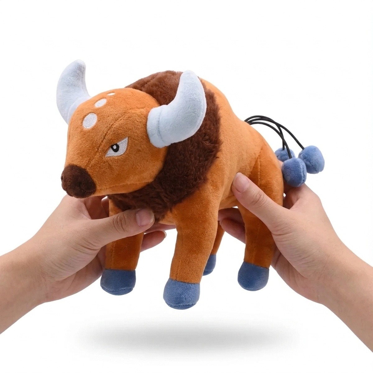 Tauros Pluszak trzymany w rękach